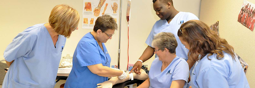 Healthcare-workers-in-scrubs-learning.png